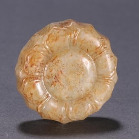 A Ming Dynasty Hetian jade lotus pendant