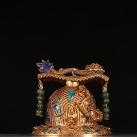 A Qing Dynasty gilt filigree baked blue hair crown