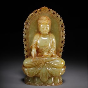 A seated statue of the Buddha of Hetian topaz in the Qing Dynasty