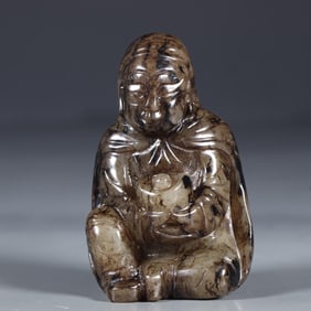 A jade figure carving from the Ming Dynasty