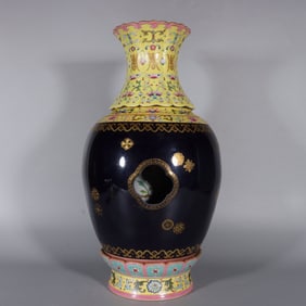 A Qing Qianlong sacrifice blue gilded rolling road yellow ground entwined lotus turning heart vase