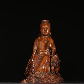 A piece of Qing Dynasty Huanghuali Manjushri Bodhisattva