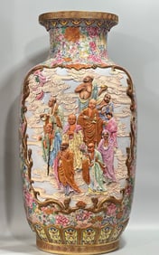 A Qing Qianlong enamel color kaleidoscope window carved figure eighteen Arhat pattern donggua bottle