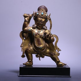 An 18th-century Tibetan bronze gilt Vajra hand statue