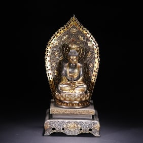 A Tibetan silver gilt Guanyin ornament