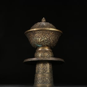 A Qing Dynasty copper gilt donor