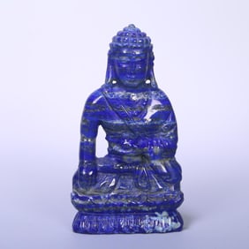 A late Qing Dynasty lapis lazuli statue of Shakyamuni