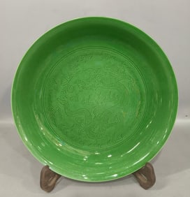 A green glazed dragon plate made in the Guangxu era of the Qing Dynasty
