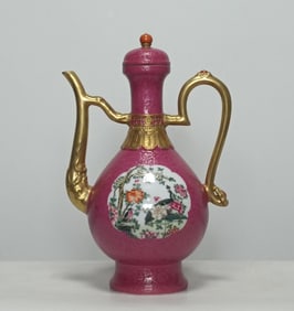 A Qing Qianlong pastel carmine red rolled road pattern gold painted window flower and bird wine pot