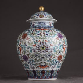 A Qing Qianlong Doucai entwined lotus pattern lid jar