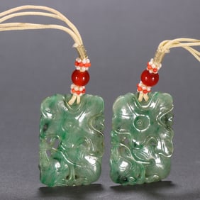 A pair  of Qing Dynasty jade lotus leaf pattern pendants