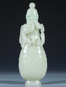 A Qing Dynasty Hetian jade beast face pattern relief dragon play bead bottle