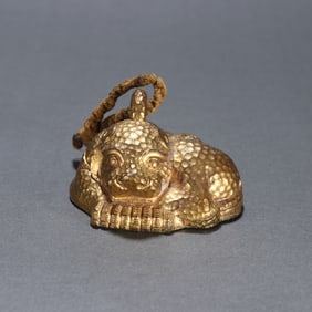 A piece of copper gilt beast ruler