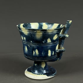 A Tanggong County kiln three-color blue glaze absorbent cup