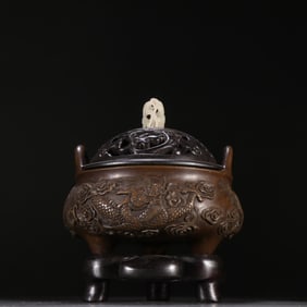 A Ming Dynasty Xuande copper amphora three-legged aroma diffuser