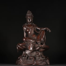 A statue of Guanyin in agarwood