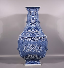 A Qing Qianlong blue and white gluttonous pattern square bottle