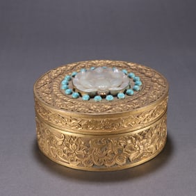 A Qing Dynasty copper gilt inlaid Hetian jade turquoise Buddha pattern lid box