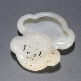 A piece of Qing Dynasty Hetian jade hand warmer