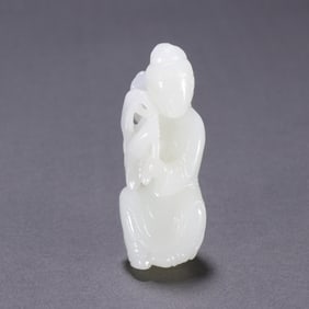 A Qing Dynasty Hetian jade maid carving