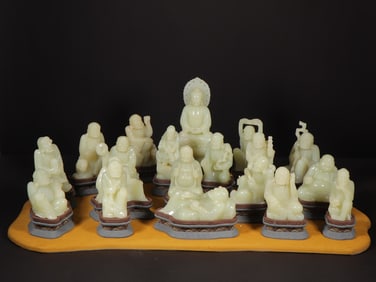 A set  of Qing Qianlong Hetian jade eighteen arhats worshiping Buddha kits
