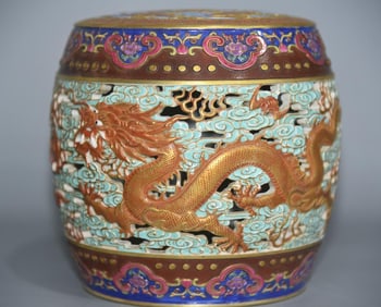 A hollow double dragon play pearl with red gold painted auspicious clouds and turquoise green drums