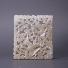 A Liao gold and Tian jade hollow flower and bird pattern pendant