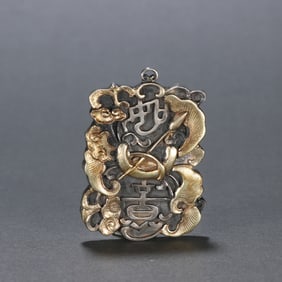 A Qing Dynasty silver gilt ruyi pattern is listed