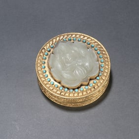 A Qing Dynasty copper gilt inlaid jade Buddha pattern lid box