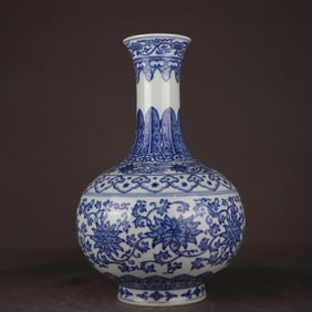 A Qing Qianlong blue and white entwined branch with an appreciation bottle