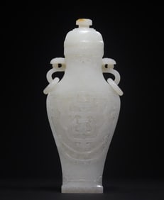 A Qing Dynasty gluttonous pattern amphora cap bottle furnisher