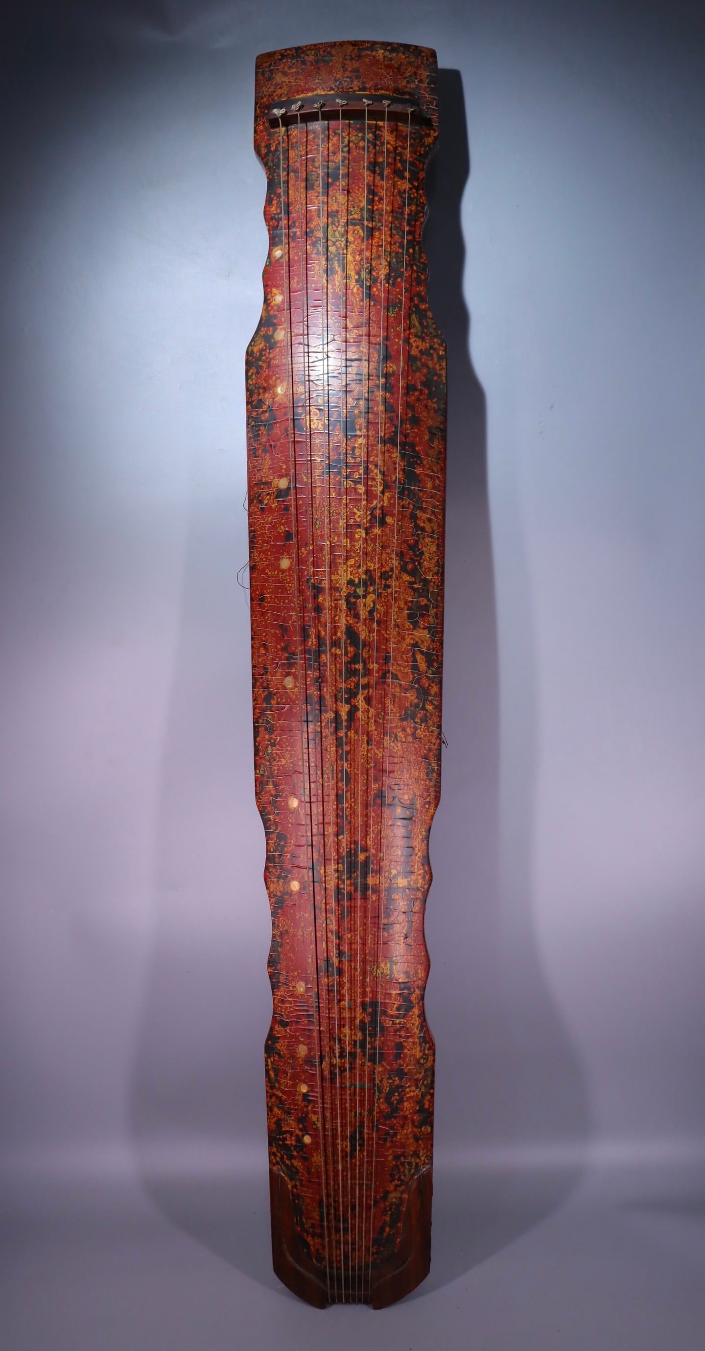 A lacquer guqin of the Qing Dynasty (1 of 9)