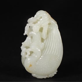 A white jade boy carving from the Qing Dynasty
