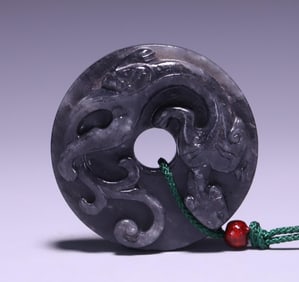 A piece of Hetian jade blue and white seed material dragon pendant