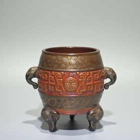 A piece of Qing Qianlong bronze glaze carved Kuifeng presents a longevity elephant ear drum incense