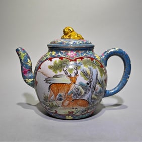 A Qianlong year enamel color fortune and continuous gold-painted consecrated pine deer purple clay