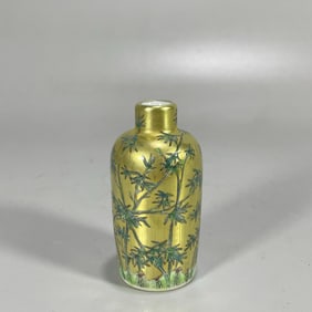 A piece of Qianlong made gold background pastel bamboo snuff bottle