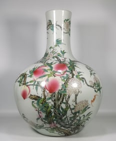 A Qing Qianlong pastel nine peach heavenly ball bottle