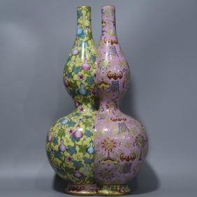 A Qing Dynasty enamel color-painted gold-painted Fu Lushou gourd bottle