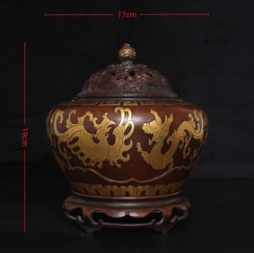 A bronze carved dragon and phoenix incense burner in the Qing Dynasty