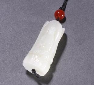 A Qing Dynasty Hetian jade three-sided Guanyin pendant