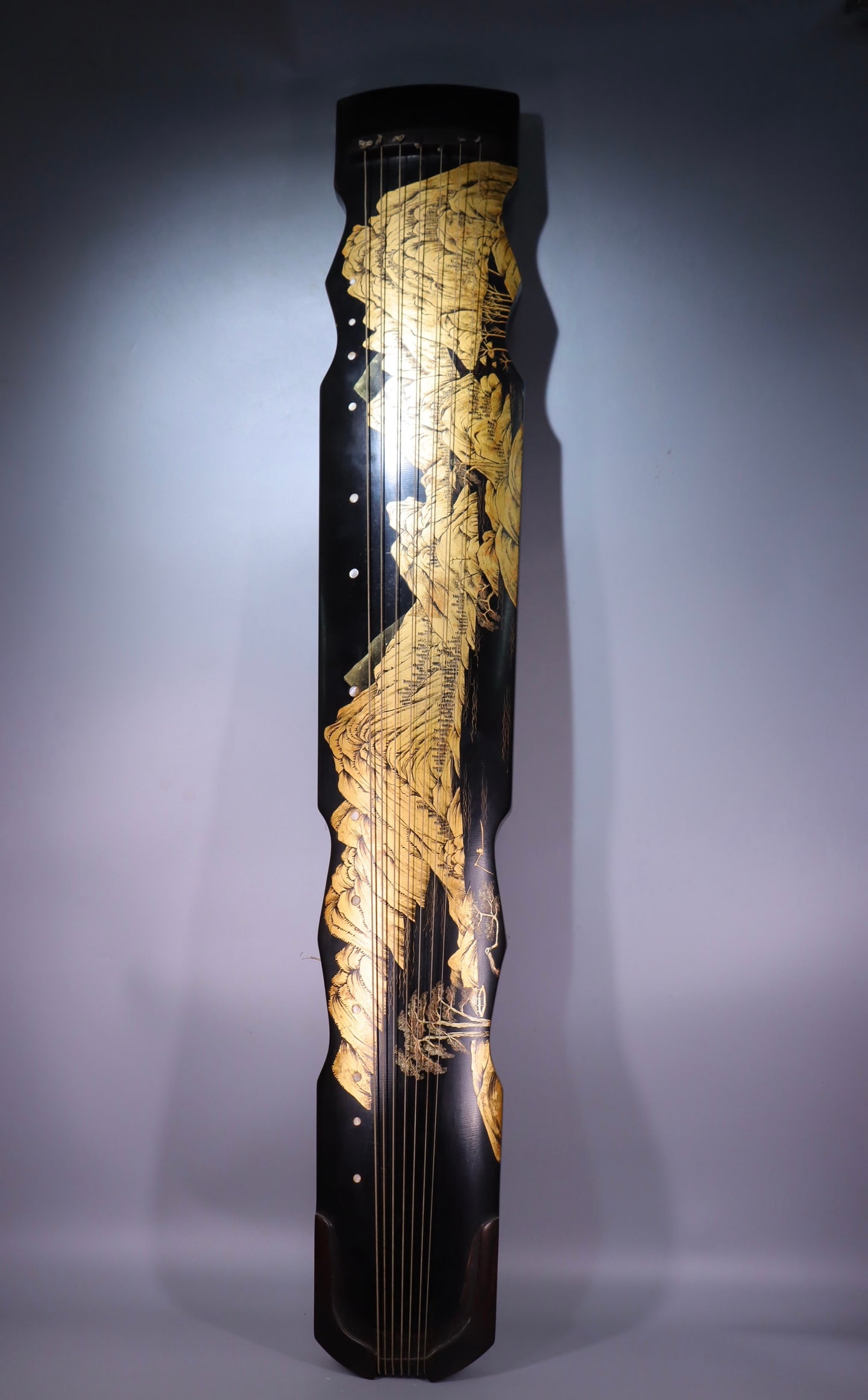 A Qing Dynasty lacquered gilded painted guqin (1 of 10)