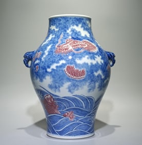 A blue and white glazed red fish leaping dragon gate amphora olive bottle
