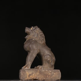 A Tang Dynasty bluestone lion ornament