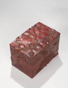 A Qing Dynasty purple pear embossed three multi-patterned bookcase