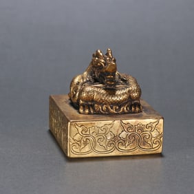 A copper-gilt dragon button seal