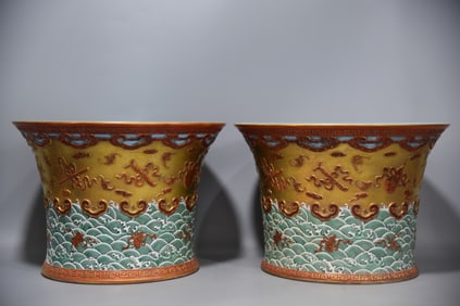 A pair  of gold-ground seawater eight-treasure pattern alum red gold-painted hollow pen holders