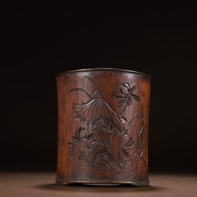 A rosewood carved lotus poetry pen holder