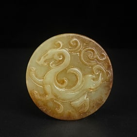 A topaz dragon and phoenix pendant of the Warring States period