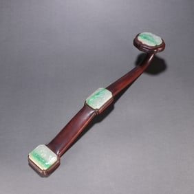 A rosewood inlaid jade flower and bird pattern ruyi handle